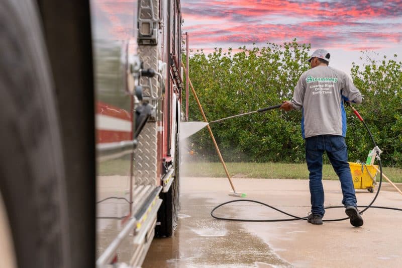 pressure washing fleet fire truck